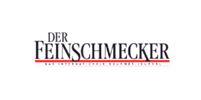 Logo of the German gastronomic magazine "Der Feinschmecker – Das Internationale Gourmet-Journal", with serif typography in black and a horizontal red line separating the title from the subtitle.